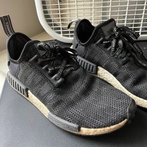 Heavily worn Adidas workout shoes
